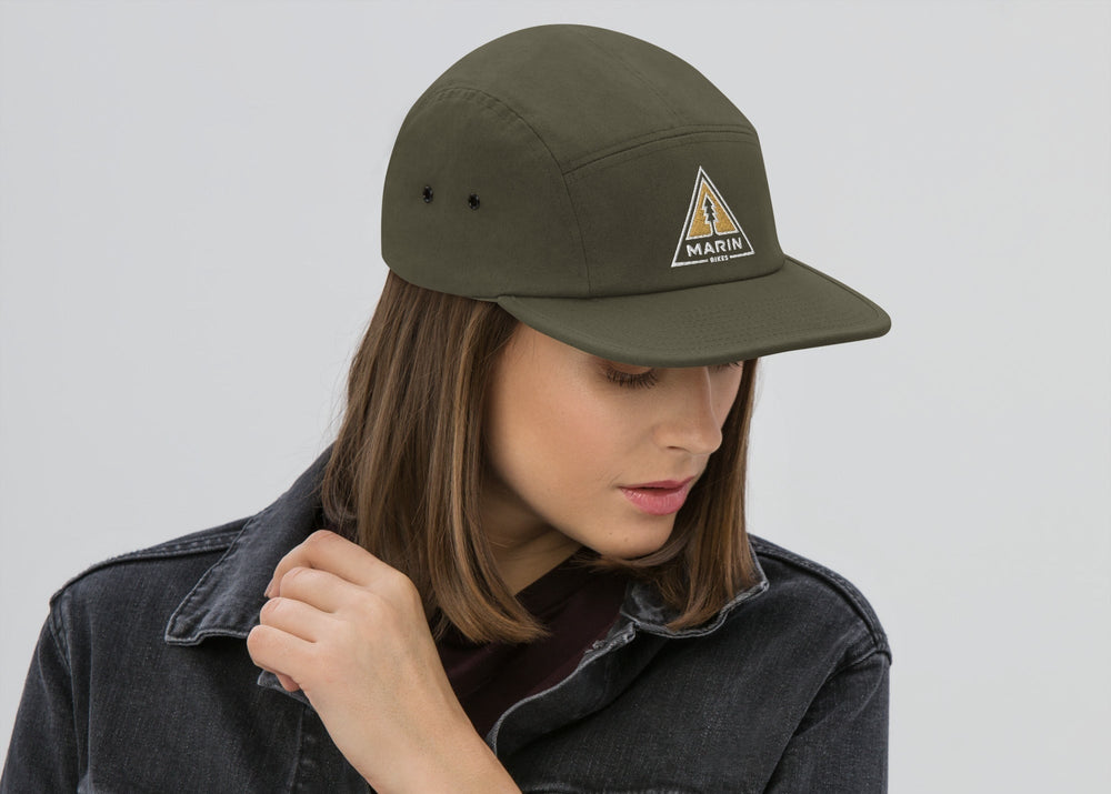 Woman wearing green Marin hat