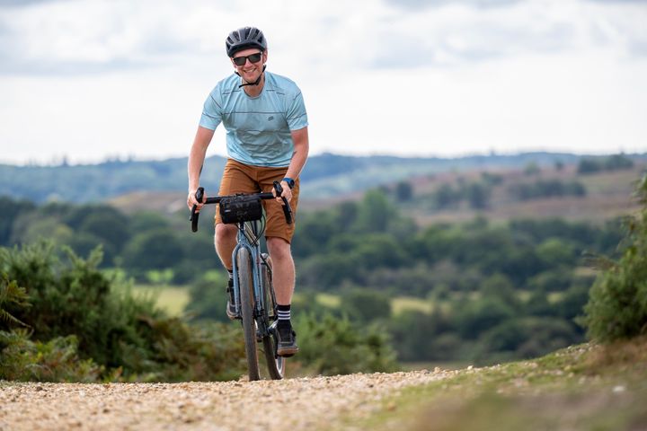man riding a drop bar gravel bike 
