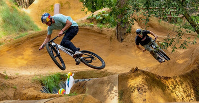 Marin sponsored rider Matt Jones riding a Marin Alcatraz dirt jump bike followed by another rider also riding a Marin Alcatraz on some mountain bike dirt jumps