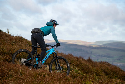 Woman riding an ebike in a remote location