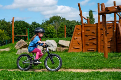 Girls rides near a play park