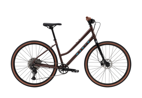 Brown bicycle with 'Mazda' branding on a white background