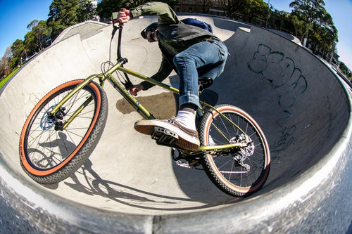 Man riding a skate bowl