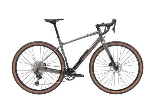 Gray bicycle with brown tires on a white background
