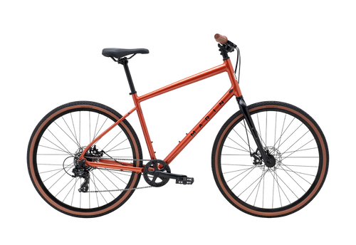 Orange bicycle on a white background