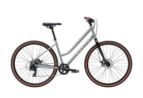 Gray bicycle with brown tires on a white background