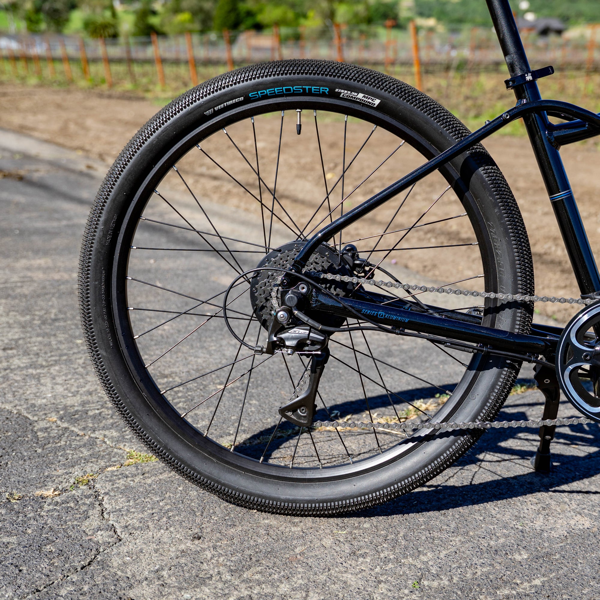 Close-up of a bicycle wheel with a blurred background