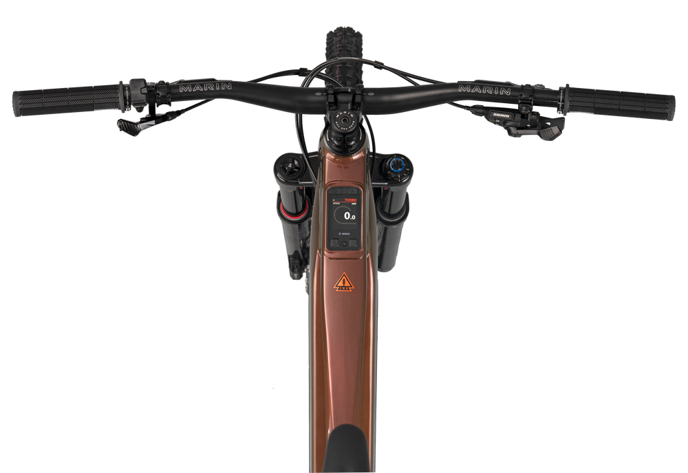 Close-up of a bicycle handlebar with a digital display on a white background