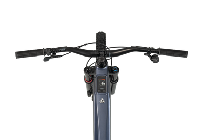 Close-up of a bicycle handlebar with control buttons on a white background