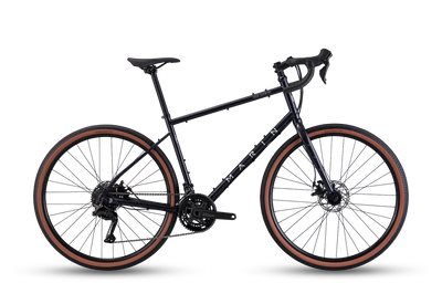 Black bicycle with brown tires on a white background