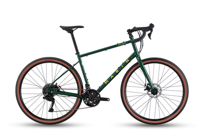 Green bicycle with brown tires on a white background