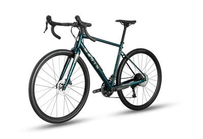 A dark teal mountain bike with black components, drop handlebars, and black wheels, shown from a three-quarters front angle on a white background with a soft shadow.