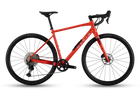 Red bicycle with black components on a white background