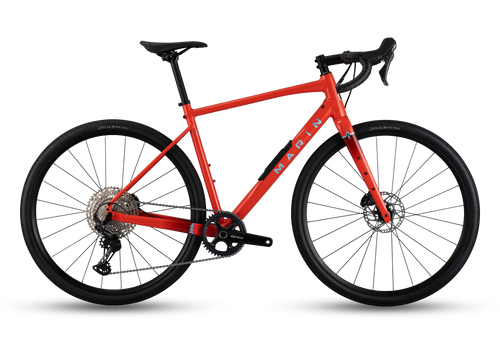 Red bicycle with black components on a white background