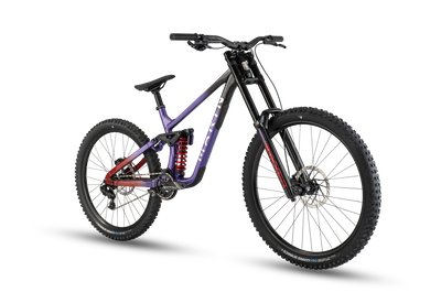 Mountain bike with purple frame and black components on a white background
