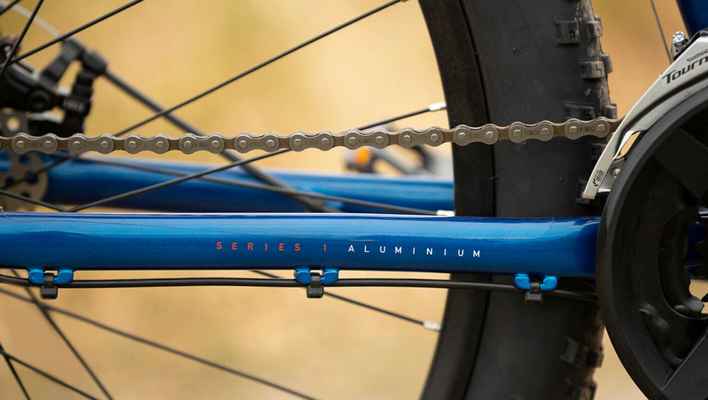A close-up image of a Marin Bikes bicycle with the words 'Series 1 Aluuminum' painted on the frame