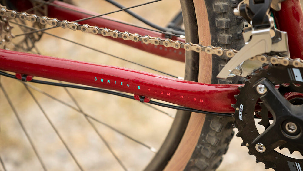 A close-up image of a Marin Bikes bicycle with the words 'Series 2 Aluuminum' painted on the frame