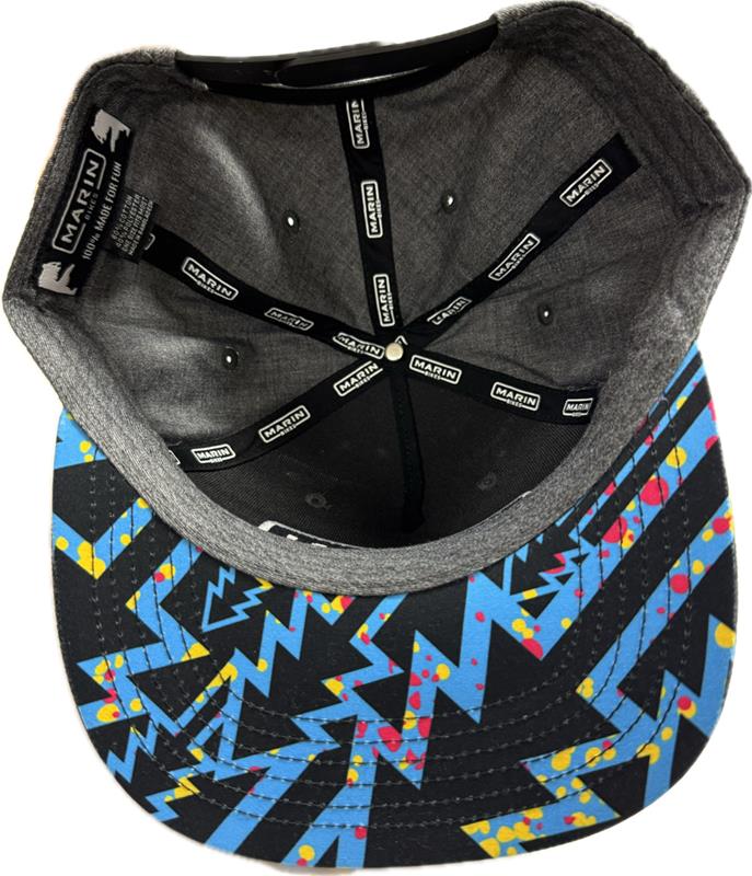Colorful geometric patterned cap with gray interior and black brim