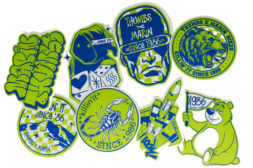 A set of die-cut stickers featuring various designs in a high-contrast lime green and dark blue color scheme, displayed on a light gray background.