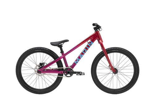 Red children's bicycle with black wheels on a transparent background
