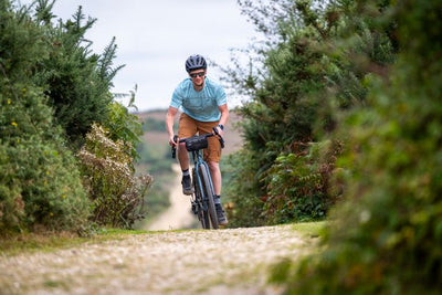 Man rides a gravel track