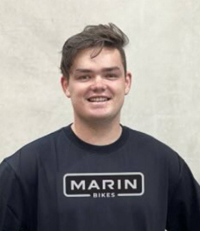Person wearing a black 'Marin Bikes' sweatshirt against a plain background