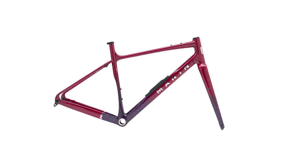 Red bicycle frame with 'MAKIN' branding on a white background